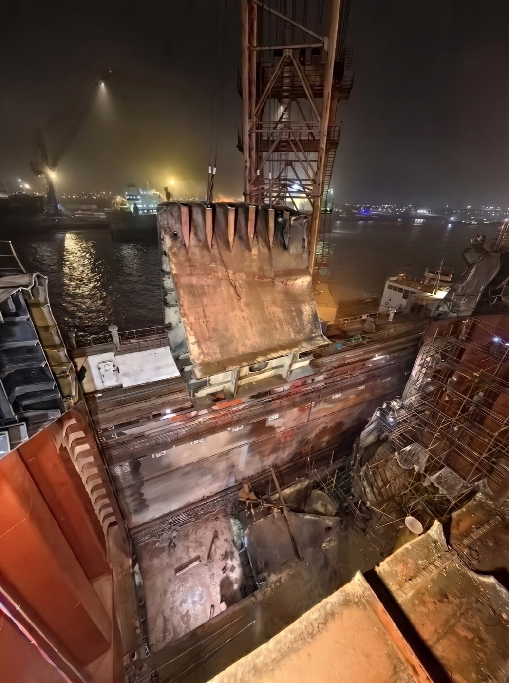 Reconstructed structure under work lights at night
