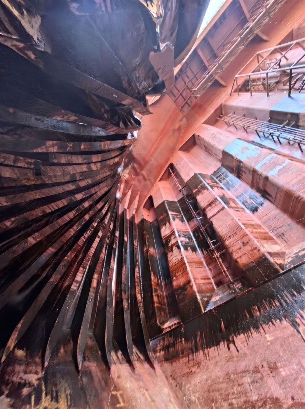 Fire-damaged plating cut away during reconstruction